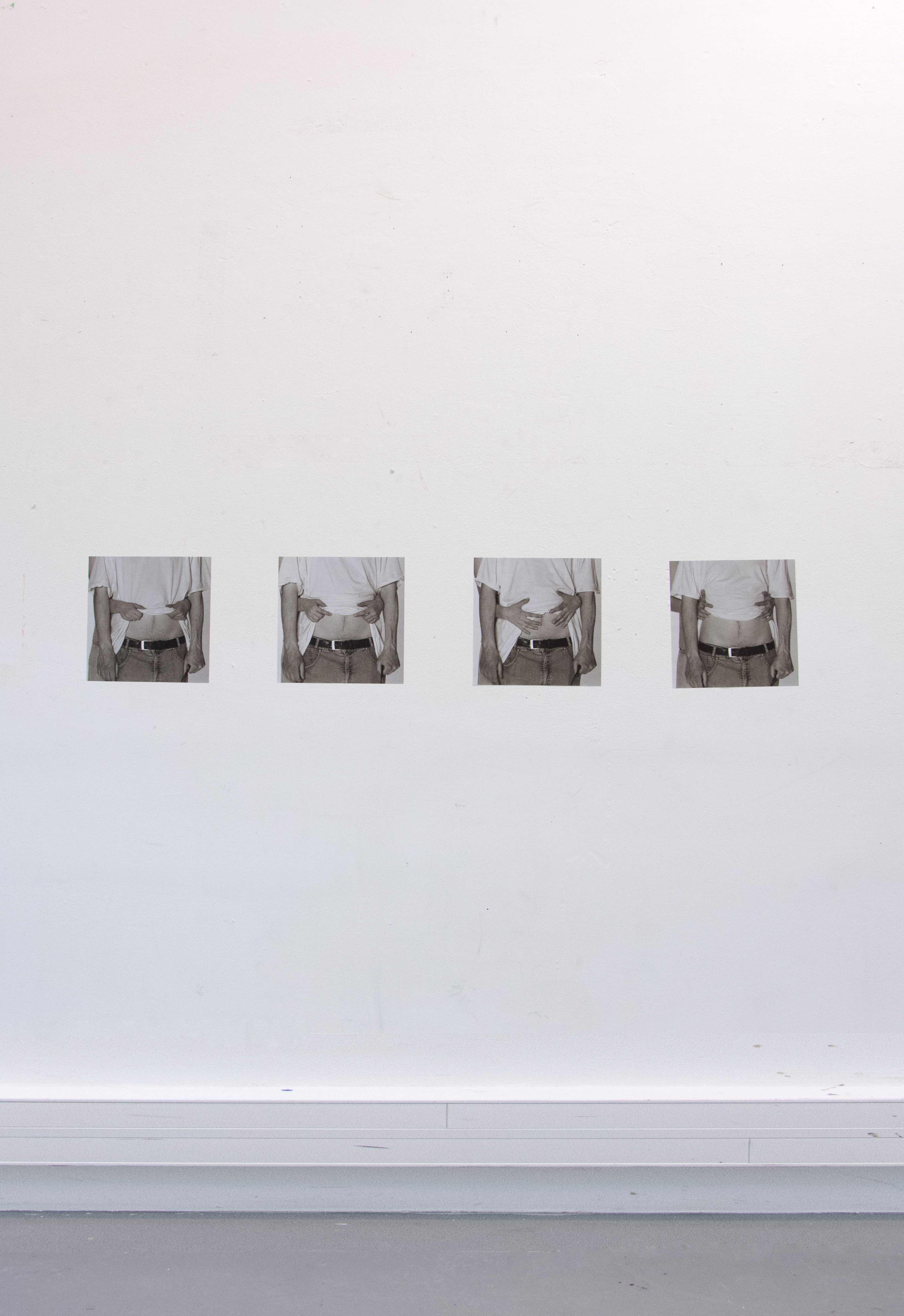 Image of the exhbiiton of all four images side by side horizontally on the whall